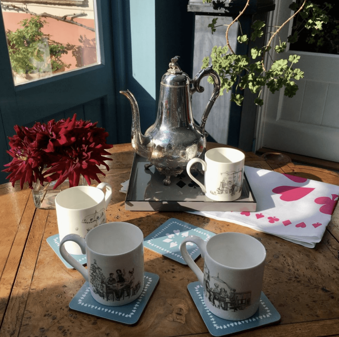 Seasonal bone china mugs from the UK bridge designs card game