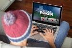 Top down photo of man in a toque playing poker on his laptop - The Importance of Responsible Gambling in Online Casino Communities