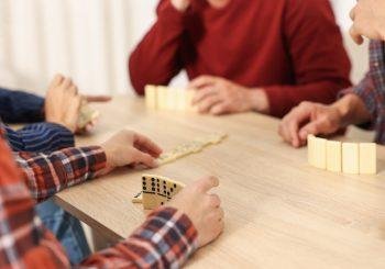Friends playing dominoes